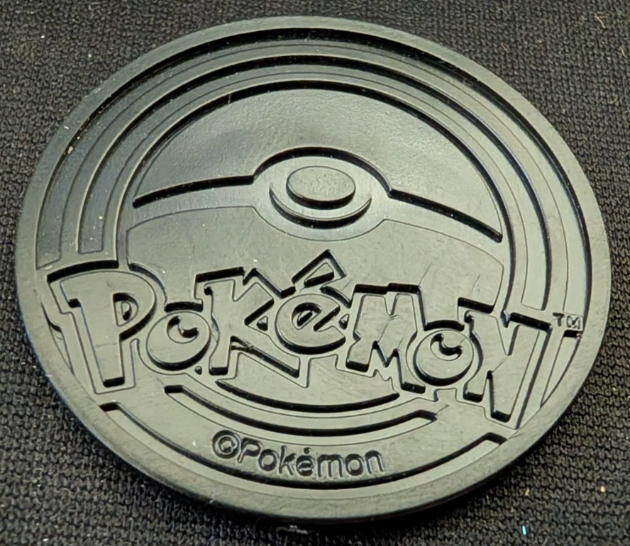 Pokemon Flip Coin Cracked Ice Holofoil Kommo-o