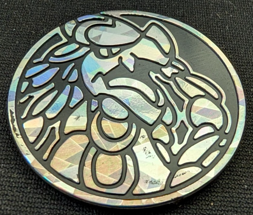 Pokemon Flip Coin Cracked Ice Holofoil Kommo-o